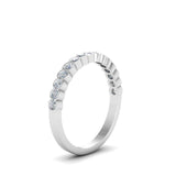 This Bezel Channel Set Diamond Band