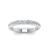 This Bezel Channel Set Diamond Band